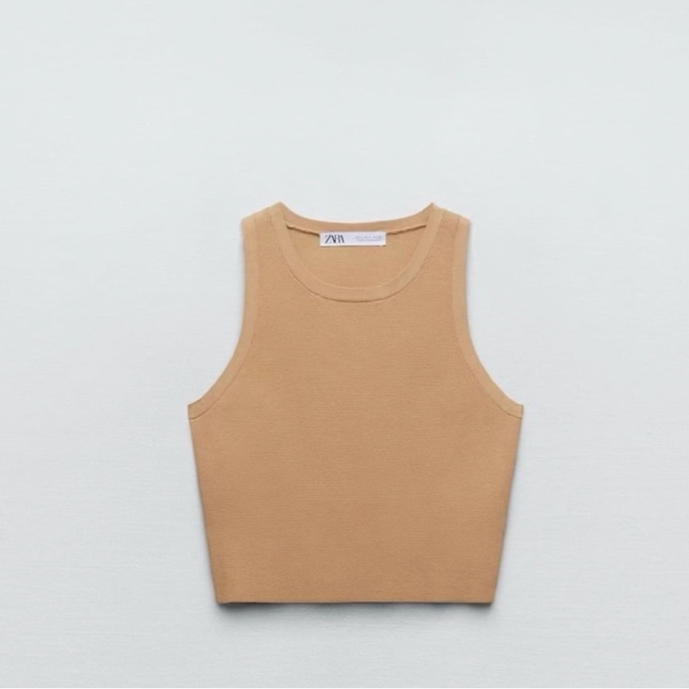 This is a tan knit Crop Top. Size- medium